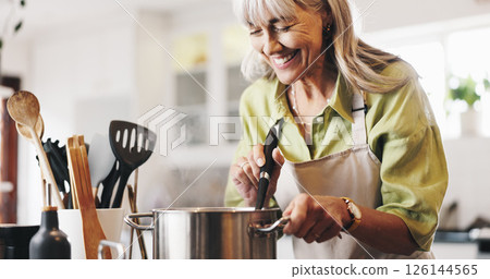 Scent, cooking and mature woman in kitchen in home with smelling dinner, meal or dish. Happy, pot and female person with satisfaction for aroma of supper with health, wellness and nutrition in house. Scent, cooking and mature woman in kitchen in home with smelling dinner, meal or dish. Happy, pot and female person with satisfaction for aroma of supper with health, wellness and nutrition in house. 126144565