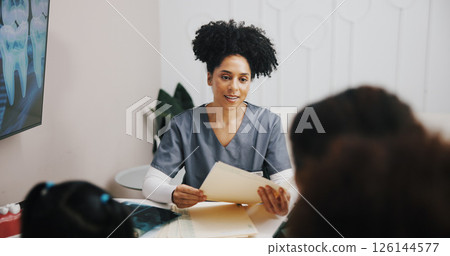 Woman, doctor and talking to patient with paperwork for medical results for advice in healthcare consultation. Clinic, person and family pediatrician with document for diagnosis or feedback in office 126144577
