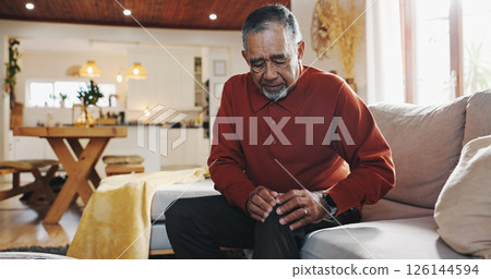 Senior man, knee pain and arthritis on couch with home, leg massage and joint problem with gout. Sofa, mature person and bone inflammation with rheumatism, crisis and living room with strain injury Senior man, knee pain and arthritis on couch with home, leg massage and joint problem with gout. Sofa, mature person and bone inflammation with rheumatism, crisis and living room with strain injury 126144594