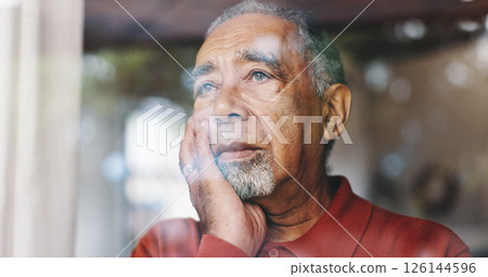 Depression, window and thinking with senior man in retirement home for loss, memories or nostalgia. Lonely, regret and sadness with unhappy person in apartment for anxiety, dementia or stress Depression, window and thinking with senior man in retirement home for loss, memories or nostalgia. Lonely, regret and sadness with unhappy person in apartment for anxiety, dementia or stress 126144596