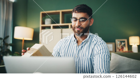 Box, package and man with laptop on sofa for delivery for online shopping, ecommerce and shipping. Happy, living room and person with parcel on computer for checklist, digital receipt and invoice Box, package and man with laptop on sofa for delivery for online shopping, ecommerce and shipping. Happy, living room and person with parcel on computer for checklist, digital receipt and invoice 126144602