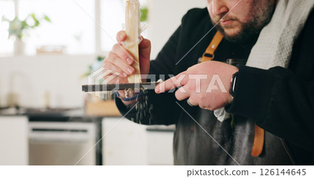 Food, cheese and hands of man with grater in house kitchen for diet, private service or nutrition. Ingredients, cooking recipe or personal chef with parmesan for gourmet cuisine, hospitality or lunch 126144645