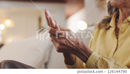 Senior woman, pain and hand for arthritis inflammation, medical problem and osteoporosis. Elderly person, palm massage and muscle injury in home with fibromyalgia, rheumatism risk and joint ache Senior woman, pain and hand for arthritis inflammation, medical problem and osteoporosis. Elderly person, palm massage and muscle injury in home with fibromyalgia, rheumatism risk and joint ache 126144790