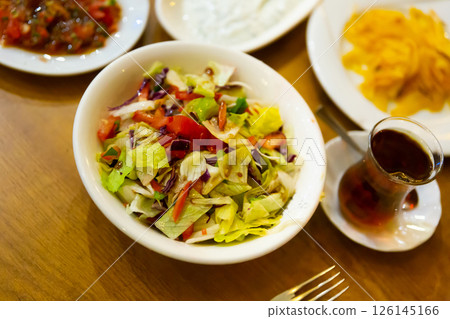 Lettuce, tomatoes Turkish starter in restaurant 126145166