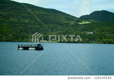 Amphibious bus floating on Lake Ashi in Hakone and beautiful natural scenery Amphibious bus floating on Lake Ashi in Hakone and beautiful natural scenery 126145430