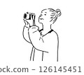 Illustration of a woman taking a picture with a camera 126145451