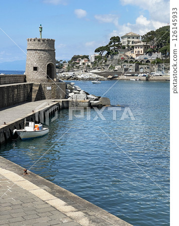 Stone old lighthouse in seafront town of Recco, Liguria. Nature, tourism and recreation, Italy. 126145933