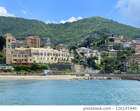 Liguria and old traditional building, church. Recco town by sea. Panoramic view with mountain. Tourism and vacation. 126145940