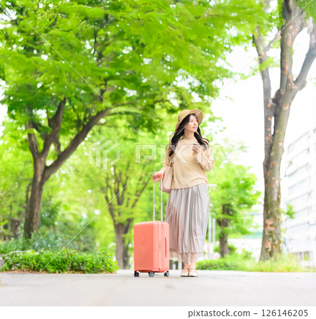 Portrait of a woman traveling Portrait of a woman traveling 126146205