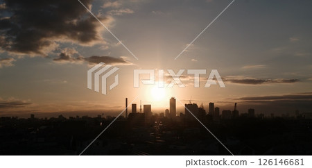 Clouds and sunrise in the city 126146681