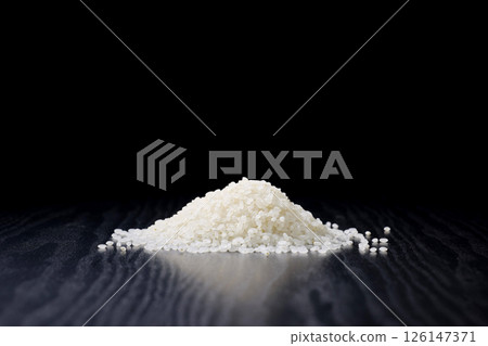 Rice on a black background Rice on a black background 126147371