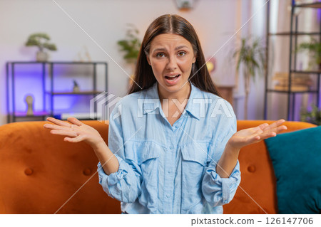 Young woman girl asking why what reason of failure demonstrating disbelief irritation by troubles Young woman girl asking why what reason of failure demonstrating disbelief irritation by troubles 126147706