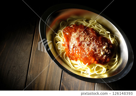 Meat sauce pasta topped with grated cheese Meat sauce pasta topped with grated cheese 126148393