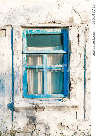window blue on village old house wall 126148719