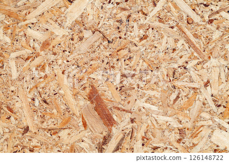 texture of wooden surface of pressed chips and sawdust, background texture of wooden surface of pressed chips and sawdust, background 126148722