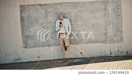 Business, funny and man with smartphone, wall and smile with connection, meme and texting. Mature person, outdoor and employee in city, cellphone and digital app for online comedy, humor and joke Business, funny and man with smartphone, wall and smile with connection, meme and texting. Mature person, outdoor and employee in city, cellphone and digital app for online comedy, humor and joke 126149420