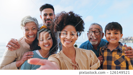 Smile, family and portrait for selfie on beach for photography, vacation memory and social media post. Happy, people and travel with kids of profile picture update, ocean getaway and bonding together 126149521