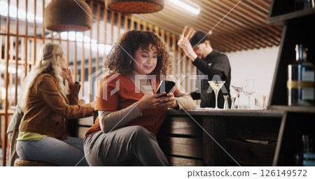 Woman, pub and waiting with smartphone at bar on internet for online dating or social media. Female person, cafe and message on app for communication, networking and connection with cocktails drinks Woman, pub and waiting with smartphone at bar on internet for online dating or social media. Female person, cafe and message on app for communication, networking and connection with cocktails drinks 126149572
