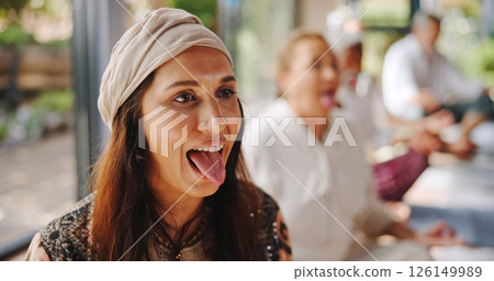 Breathing, meditation and tongue out with woman in yoga class for pranayama or stress relief. Fitness, lions breath and wellness with yogi people in studio for balance, inner peace or mental health Breathing, meditation and tongue out with woman in yoga class for pranayama or stress relief. Fitness, lions breath and wellness with yogi people in studio for balance, inner peace or mental health 126149989