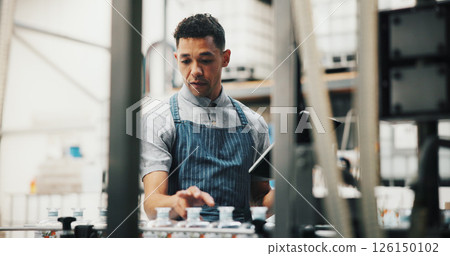 Distillery, tablet and man in factory for inspection of alcohol, production and manufacturing checklist. Brewery, industrial and person on digital tech for fermentation, quality control or storage Distillery, tablet and man in factory for inspection of alcohol, production and manufacturing checklist. Brewery, industrial and person on digital tech for fermentation, quality control or storage 126150102