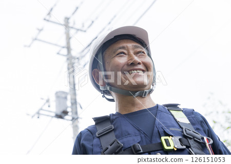 Senior worker standing with a smile 126151053