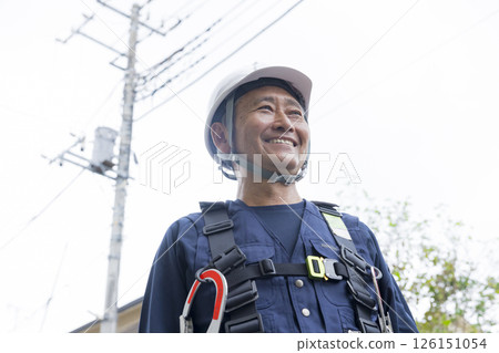 Senior worker standing with a smile 126151054