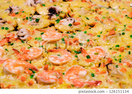 omelette with shrimp and seafood on street food market 126151134