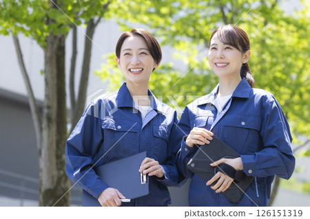 Business: Portrait of a woman wearing work clothes. Photo courtesy of Sky Perfect Tokyo Media Center. Business: Portrait of a woman wearing work clothes. Photo courtesy of Sky Perfect Tokyo Media Center. 126151319