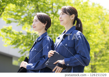 Business: Portrait of a woman wearing work clothes. Photo courtesy of Sky Perfect Tokyo Media Center. Business: Portrait of a woman wearing work clothes. Photo courtesy of Sky Perfect Tokyo Media Center. 126151320