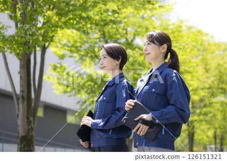 Business: Portrait of a woman wearing work clothes. Photo courtesy of Sky Perfect Tokyo Media Center. Business: Portrait of a woman wearing work clothes. Photo courtesy of Sky Perfect Tokyo Media Center. 126151321