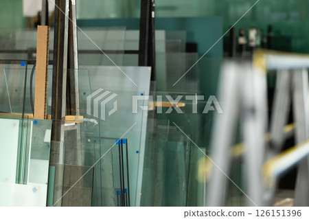 Glass sheets in warehouse at glass factory Glass sheets in warehouse at glass factory 126151396