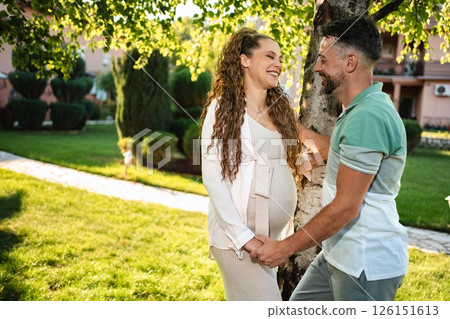 Expecting joy in a tranquil garden under bright sunlight Expecting joy in a tranquil garden under bright sunlight 126151613