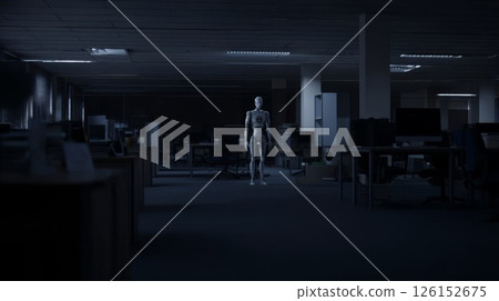 A robot standing in a dark office 126152675