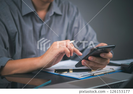 Man working, smartphone essential tool. Business, finance, data. Office, marketing. Man working, smartphone essential tool. Business, finance, data. Office, marketing. 126153177