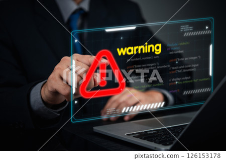 Cybersecurity warning concept. businessman pointing screen red alert sign, cyber threats, hacking risks, and system vulnerability. Digital security breach warning with a futuristic online threats. Cybersecurity warning concept. businessman pointing screen red alert sign, cyber threats, hacking risks, and system vulnerability. Digital security breach warning with a futuristic online threats. 126153178