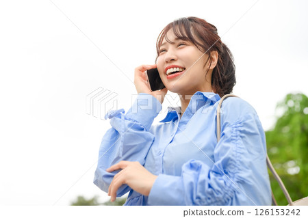 Portrait of smartphone and female Portrait of smartphone and female 126153242