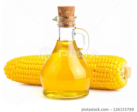 Corn syrup in a glass bottle with corn next to it over white background 126153789