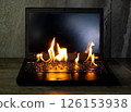 The computer laptop is burning with flames 126153938