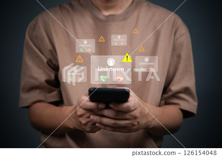 mobile user holding a phone incoming call alerts from unknown number, warning icons, signs and alert notifications, mobile security, privacy concerns, and call scams. phone security risks. 126154048