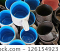 Stack of various Ceramic Mugs. 126154923