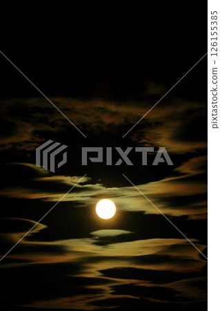 Corn moon shining in the clouds Corn moon shining in the clouds 126155385