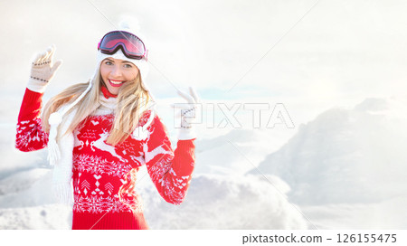 Young woman in red winter pullover, white hat and ski goggles smile happy, blurred snow country background, free space for text right side Young woman in red winter pullover, white hat and ski goggles smile happy, blurred snow country background, free space for text right side 126155475