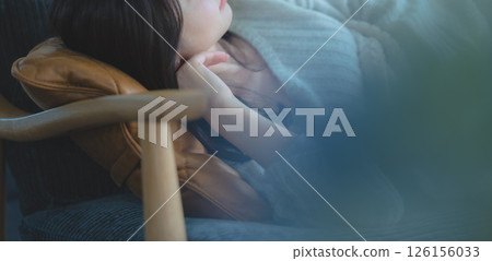 Japanese woman sleeping on the sofa 126156033