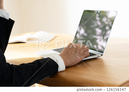 Man working on laptop Man working on laptop 126156147