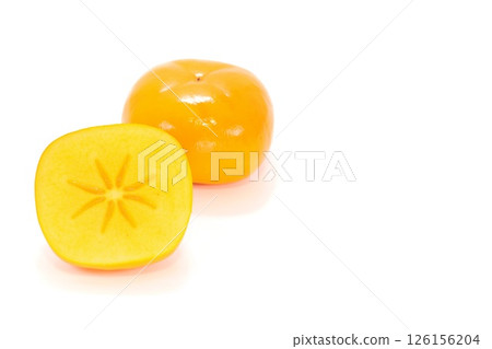 Okesa persimmon from Niigata Prefecture, cut, cross section, seedless, light background 126156204