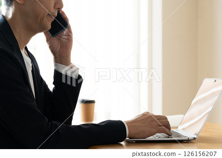 Man working on laptop Man working on laptop 126156207