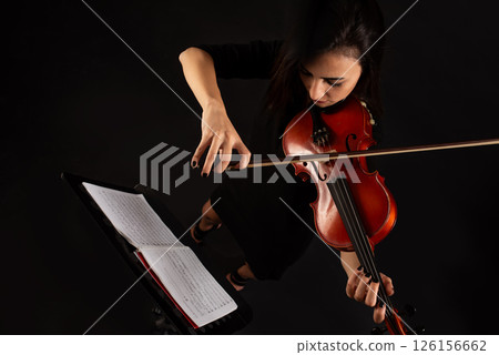 Top view portrait of female musician or violinist. 126156662