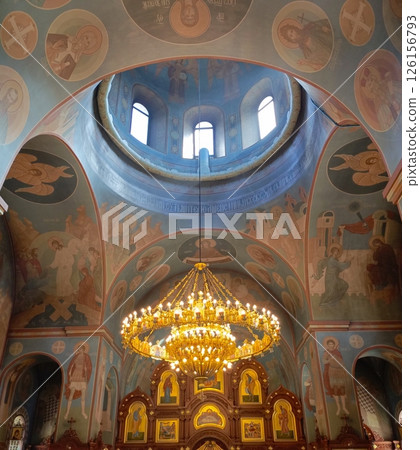 Majestic Orthodox Church Dome with Religious Icons in Gold and Pastel Blues 126156793