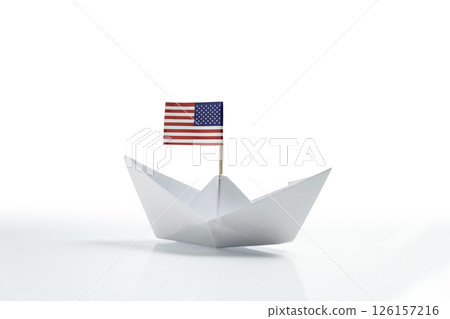 Paper boat with the USA or United States of America flag on a white background 126157216