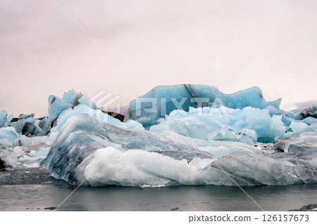 View of the melting glacier on Jokulsarlon or Glacier Lagoon, Iceland 126157673
